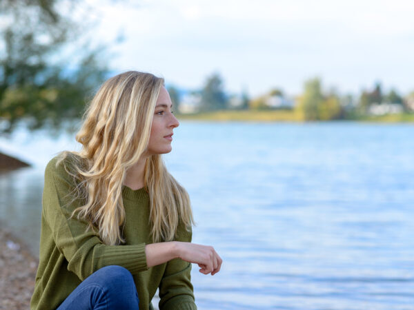 Bigstock Young Thoughtful Woman Sitting 206788408