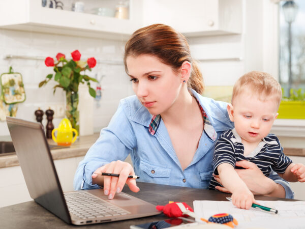 Bigstock Young Mother Working With Her 119546201