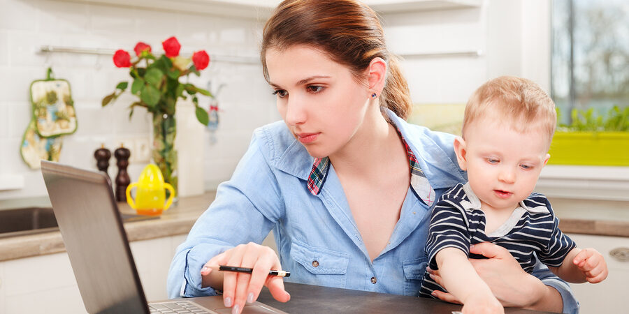 Bigstock Young Mother Working With Her 119546201